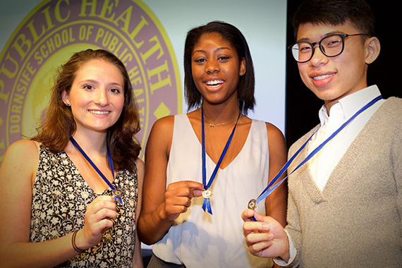 Photo of three students at Welcome Ceremony